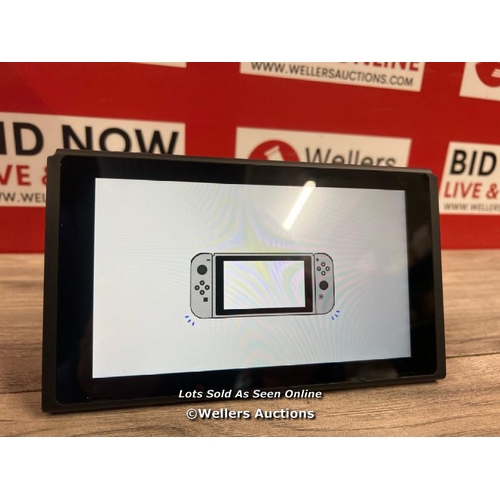 8105 - NINTENDO SWITCH CONSOLE  / SCREEN ONLY / POWERS UP / SIGNS OF USE / NOT FULLY TESTED / WITHOUT CONTR... 