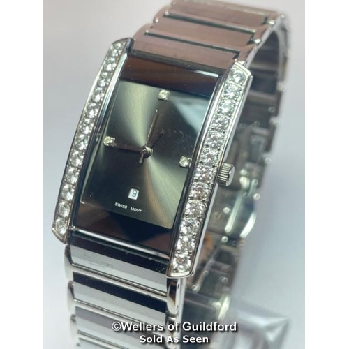 311 - Tungsten wristwatch, quartz movement, tank style case with cubic zirconia borders on mirror bracelet... 