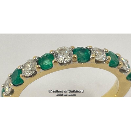 342 - Emerald and diamond eternity half band stamped 18ct, ring size o, diamond weight 0.40ct estimated di... 