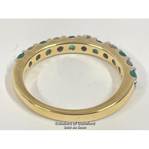 342 - Emerald and diamond eternity half band stamped 18ct, ring size o, diamond weight 0.40ct estimated di... 