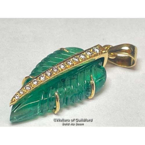 346 - Leaf cut emerald pendant set with thirteen brilliant cut diamonds, estimated diamond weight 0.15ct, ... 