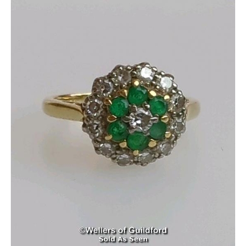 367 - Emerald and diamond round cluster ring in hallmarked 18ct gold. Central brilliant cut diamond estima... 