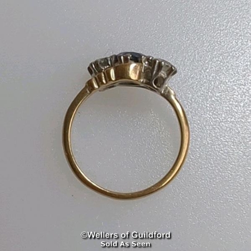 369 - Synthetic sapphire and white sapphire three stone ring in a mount stamped 9ct gold. Ring size L. Gro... 