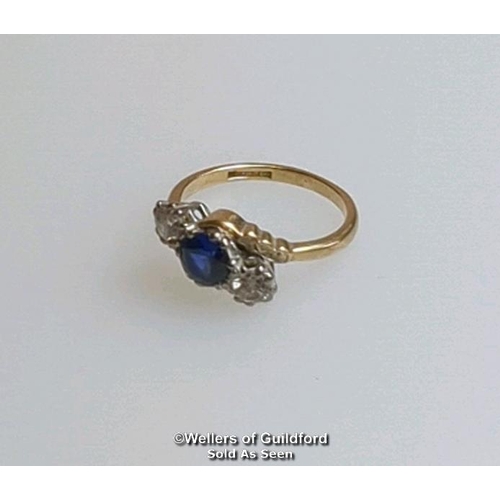 369 - Synthetic sapphire and white sapphire three stone ring in a mount stamped 9ct gold. Ring size L. Gro... 