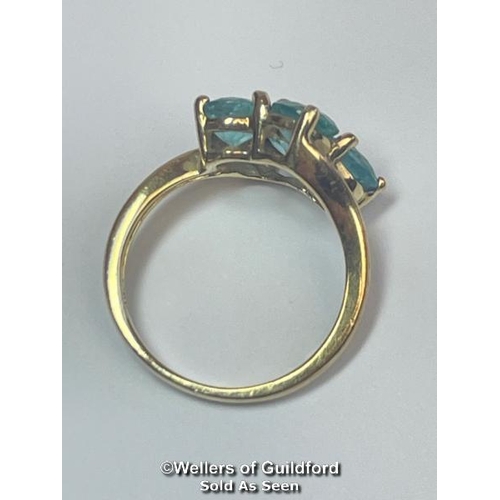 382 - Blue topaz (untested) qautrefoil ring in hallmarked 9ct gold by QVC, ring size J, weight 2.51g