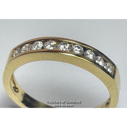 390 - Diamond channel set eternity half band ring in hallmarked 18ct gold. Estimated diamond weight 0.25ct... 