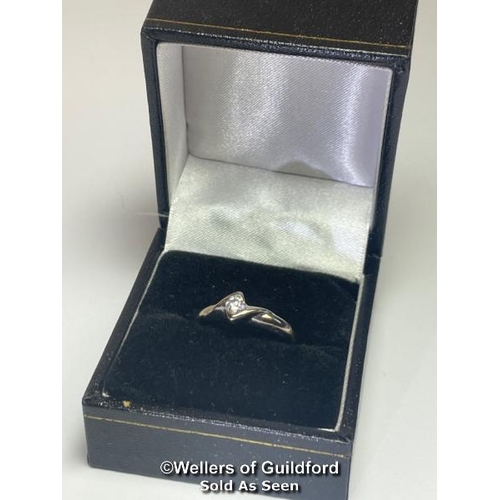 391 - Diamond solitaire ring in square twist setting. Hallmarked 18ct gold. Estimated diamond weight 0.15c... 