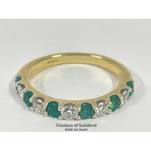 342 - Emerald and diamond eternity half band stamped 18ct, ring size o, diamond weight 0.40ct estimated di... 