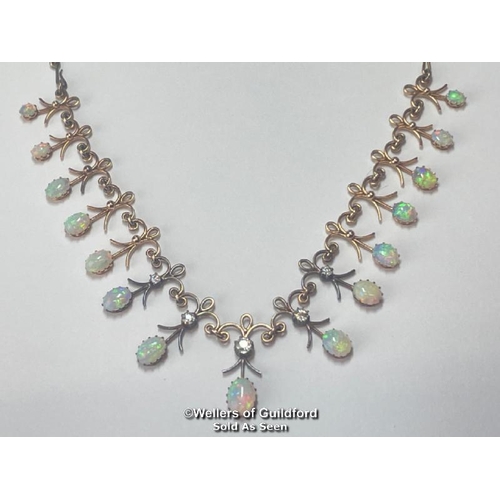 349 - Early 20th Century opal and diamond fringe necklace with fifteen oval opals measuring approx. 8x6mm ... 