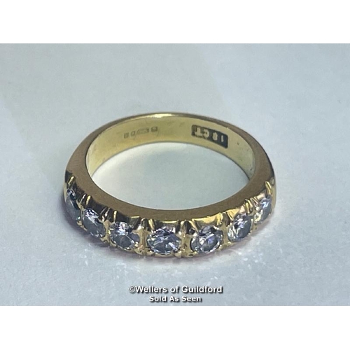 353 - Diamond eternity half band ring in 18ct gold. Seven round cut brilliant diamonds estimated total wei... 