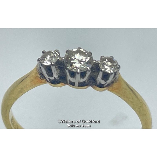 358 - Diamond three stone ring. Estimated total diamond weight 0.22ct. Shank stamped 18ct and PT. Ring siz... 