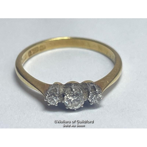 358 - Diamond three stone ring. Estimated total diamond weight 0.22ct. Shank stamped 18ct and PT. Ring siz... 