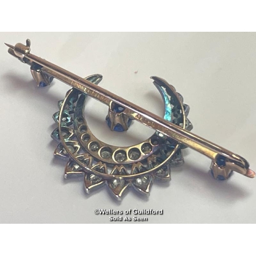 360 - Late Victorian diamond and sapphire cresent bar brooch. Three round old cut sapphires estimated tota... 