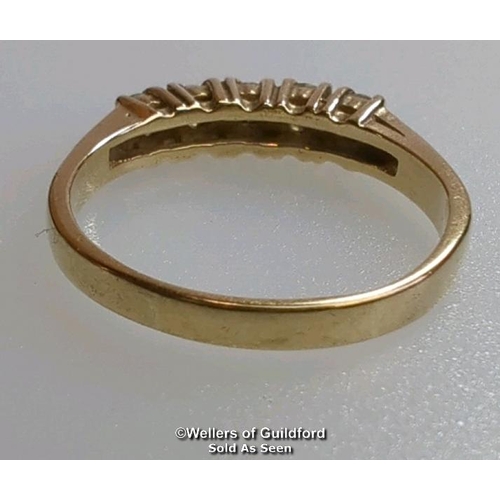 376 - Five stone cubic zirconia ring in hallmarked 9ct gold. Diameter of stones 3.2mm. Ring size R1/2. Gro... 