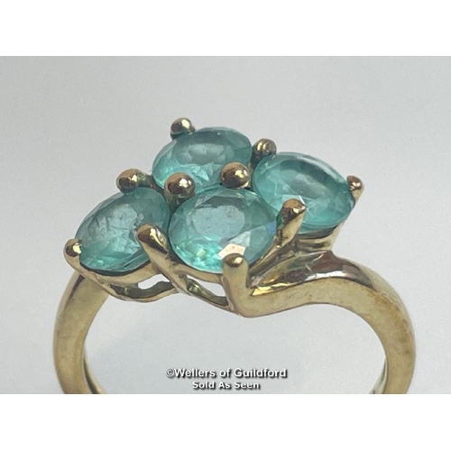 382 - Blue topaz (untested) qautrefoil ring in hallmarked 9ct gold by QVC, ring size J, weight 2.51g