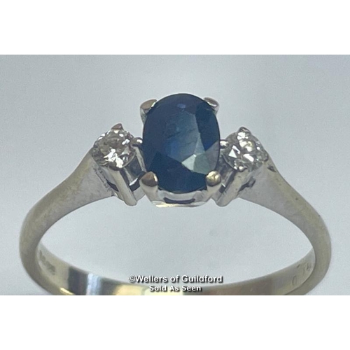 383 - Oval sapphire and diamond three stone ring in 18ct gold. Estimated weight of saphire 0.67ct, estimat... 