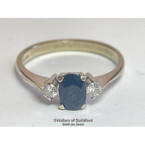 383 - Oval sapphire and diamond three stone ring in 18ct gold. Estimated weight of saphire 0.67ct, estimat... 