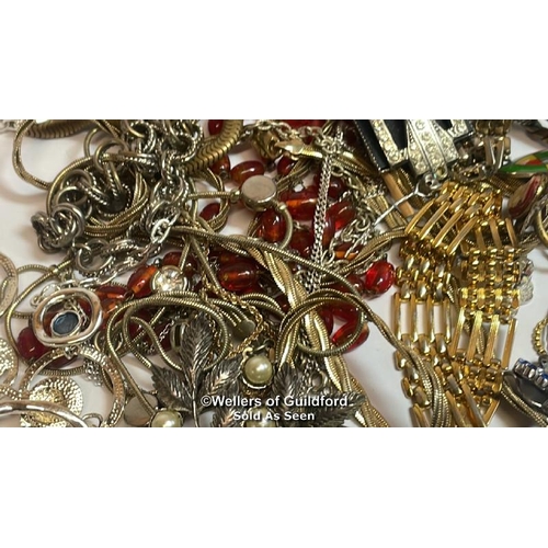 397 - Assorted costume jewellery including brooches, necklaces, bangles and cufflinks