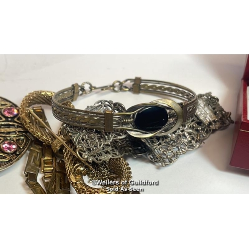 397 - Assorted costume jewellery including brooches, necklaces, bangles and cufflinks