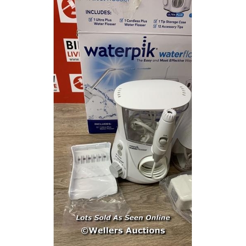 2002 - WATERPIK WATER FLOSSER / POWERS UP / SIGNS OF USE / D17