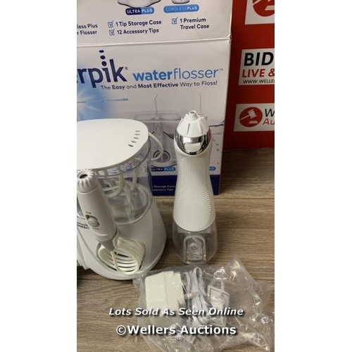 2002 - WATERPIK WATER FLOSSER / POWERS UP / SIGNS OF USE / D17