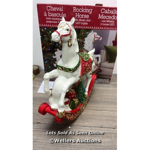 2009 - 18 INCH (46CM) LED ROCKING HORSE WITH MUSIC / SLIGHT CHIP ON TAIL / MINIMAL SIGNS OF USE / D11