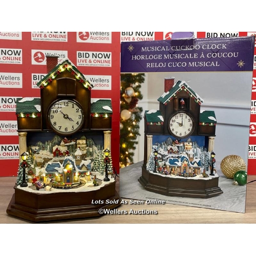 4009 - MUSICAL CUCKOO CLOCK / GOOD COSMETIC CONDITION, POWERS UP WITH LIGHTS, MOVEMENT AND MUSIC