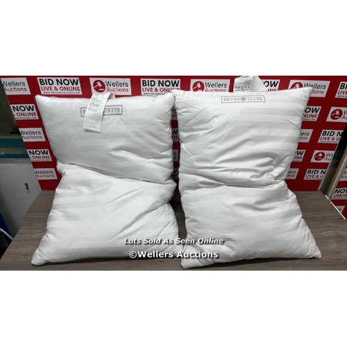 9206 - HOTEL GRAND DOWN ROLL PILLOWS / SIGNS OF USE