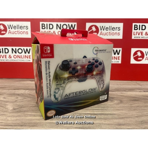 9588 - NINTENDO SWITCH AFTERGLOW WIRED CONTROLLER / POWERS UP / WITH CABLE / MINIMAL SIGNS OF USE / T53