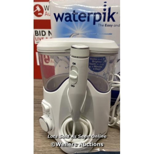 6342 - WATERPIK WATER FLOSSER / POWERS UP, SIGNS OF USE / E70