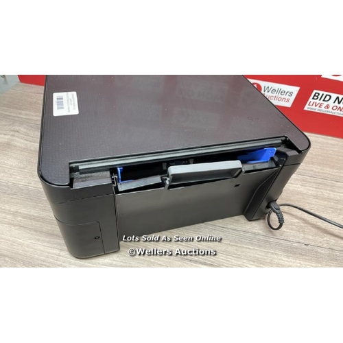 6065 - EPSON ECOTANK ET-2711 PRINTER / DAMAGED BACK(SEE IMAGES) / POWERS UP / SIGNS OF USE / B10