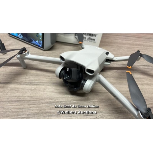 6368 - DJI MINI 3 DRONE WITH DJI REMOTE CONTROL / POWERS UP AND FLIES, GIMBLE STUCK, USER LOCKED BUT THIS D... 