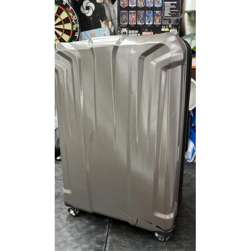 115 - LARGE SAMSONITE ENDURE HARDSIDE SUITCASE / CRACKED ABOVE ONE WHEEL / SINGS OF USE / ZIPS OK, WHEELS ... 