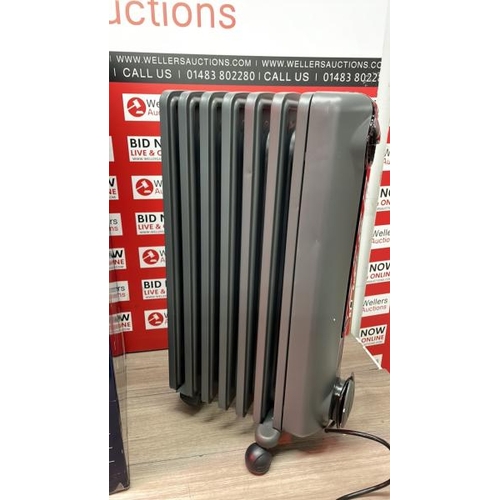 15 - DE'LONGHI RADIA S OIL FILLED 1.5KW GREY RADIATOR TRRS0715E.G / SMALL DENT / POWERS UP / MINIMAL SIGN... 