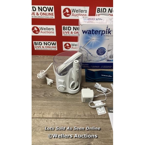 8196 - WATERPIK WATER FLOSSER ULTRA PLUS AND CORDELSS PLUS / POWERS UP, SIGNS OF USE / E47