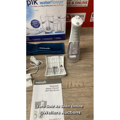 8196 - WATERPIK WATER FLOSSER ULTRA PLUS AND CORDELSS PLUS / POWERS UP, SIGNS OF USE / E47