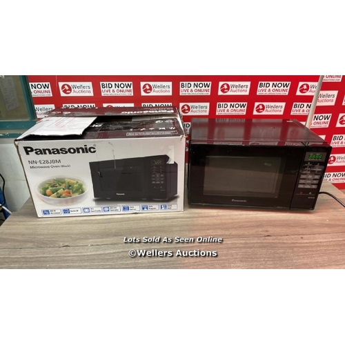 4143 - PANASONIC SOLO BLACK MICROWAVE / POWERS UP / SIGNS OF USE / A9