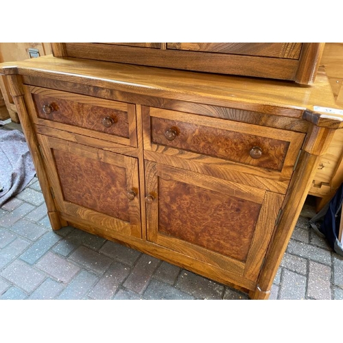 17 - LARGE OAK DISPLAY CABINET, TWO DRAWERS WITH TWO CUPBOARD DOORS BELOW, INCL. TWELVE BOTTLE WINE RACK,... 