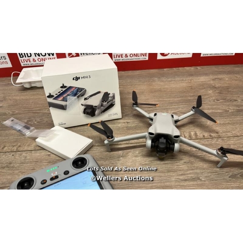 8253 - DJI MINI 3 DRONE WITH DJI REMOTE CONTROL / MINIMAL, IF ANY SIGNS OF USE / POWERS UP, FLYS AND APPEAR... 