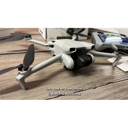 8254 - DJI MINI 3 DRONE WITH DJI REMOTE CONTROL / MINIMAL SIGNS OF USE / POWERS UP, FLYS AND APPEARS TO BE ... 