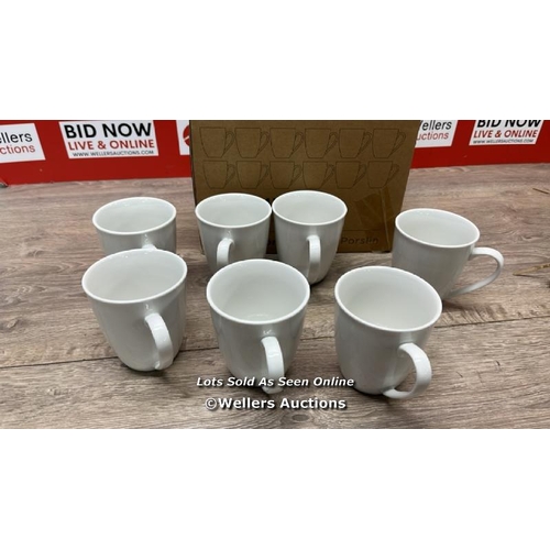 2105 - PORCELAIN MUG SET / NEW BUT SEVEN MUGS ONLY / E60