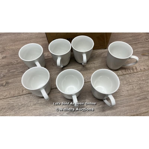 2105 - PORCELAIN MUG SET / NEW BUT SEVEN MUGS ONLY / E60