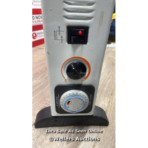 3064 - HOMEBASE ELECTRIC HEATER / POWERS UP / SIGNS OF USE / C43