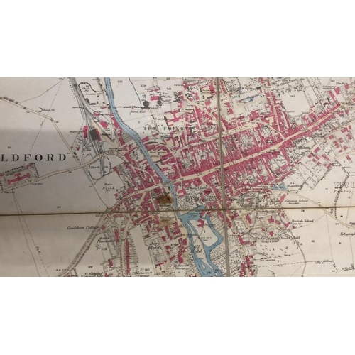 28 - A large 25 inches to 1 mile scale map of Guildford, surveyed in 1827, 202.5cm x 134.5cm opened, fold... 