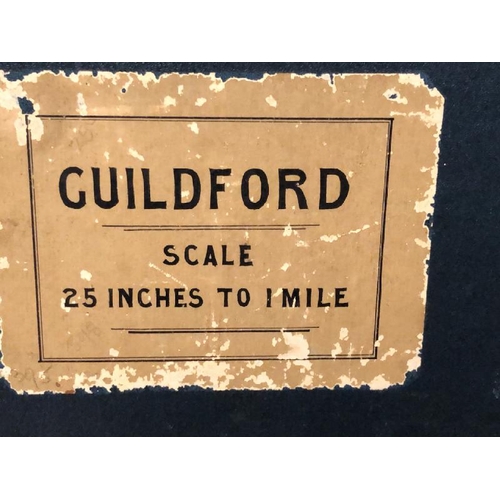 28 - A large 25 inches to 1 mile scale map of Guildford, surveyed in 1827, 202.5cm x 134.5cm opened, fold... 