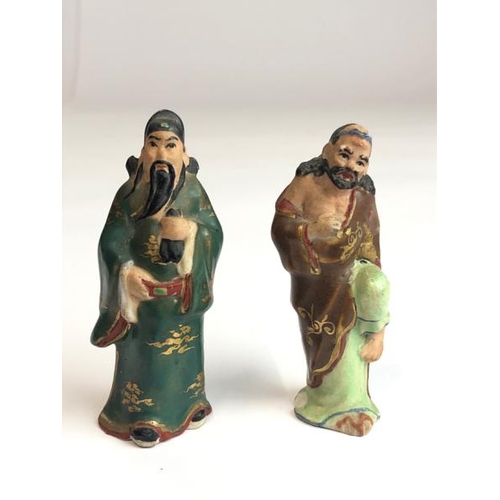 11 - Eight Chinese miniature hand painted figurines representing the eight immortals, tallest 7cm high / ... 