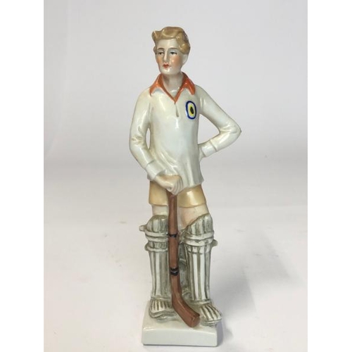 19 - Ceramics including a vintage German porcelain figure of a hockey player, Spode 