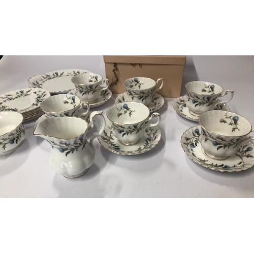 20 - A boxed Leonardo Collection cup and saucer set with a part Royal Albert 