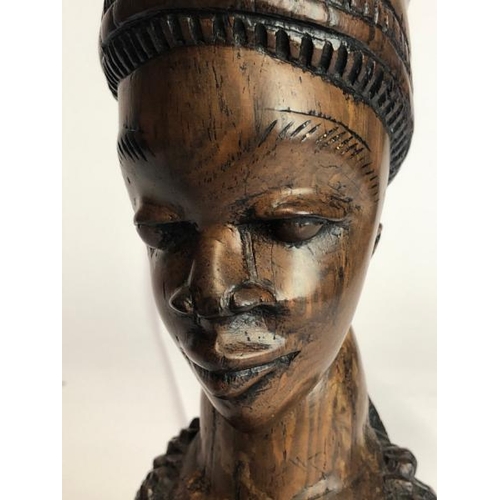 23 - African art carved wooden bust of a lady with figures in her hair, 40cm high / AN4