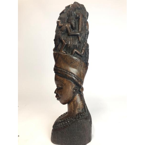 23 - African art carved wooden bust of a lady with figures in her hair, 40cm high / AN4